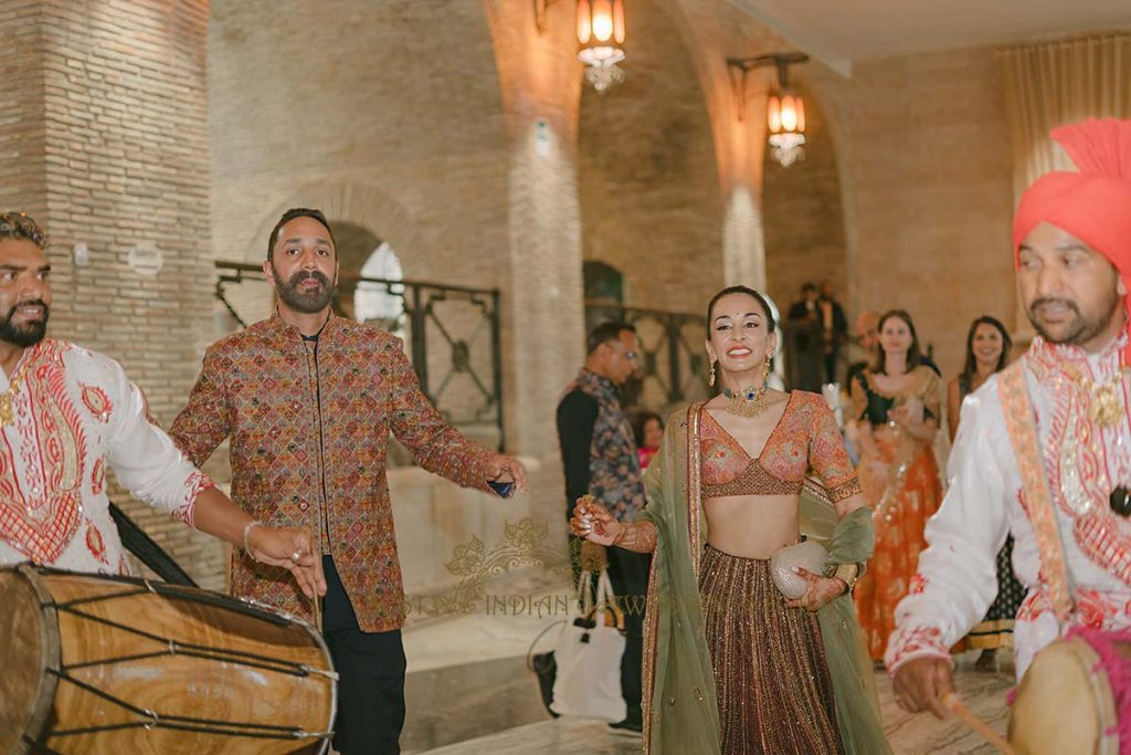 sikh bride and groom entrance at pre party in italy 1024x683 - Exclusive Sikh Pre-Wedding Celebrations in Rome: A Luxurious Multi-Venue Experience