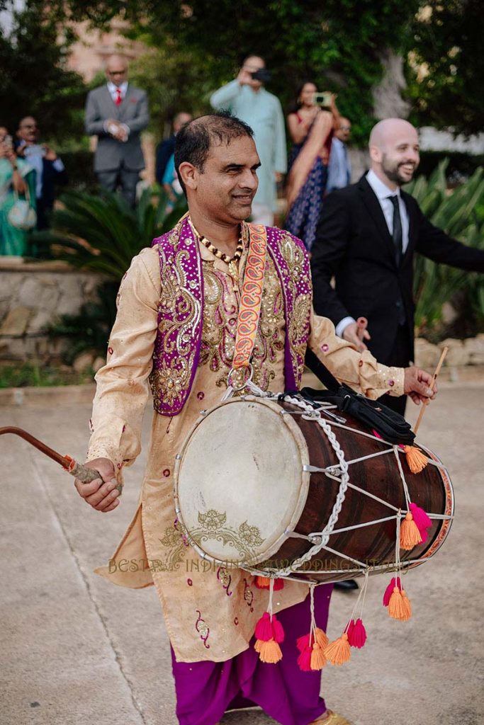 dhol player wedding in sicily 683x1024 - A Cross-Cultural Fairytale in Sicily: A South-Indian Wedding Celebration Overlooking the Sea