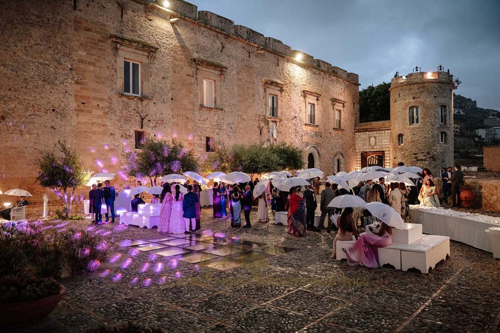 rain wedding italy umbrella 1024x682 - A Cross-Cultural Fairytale in Sicily: A South-Indian Wedding Celebration Overlooking the Sea