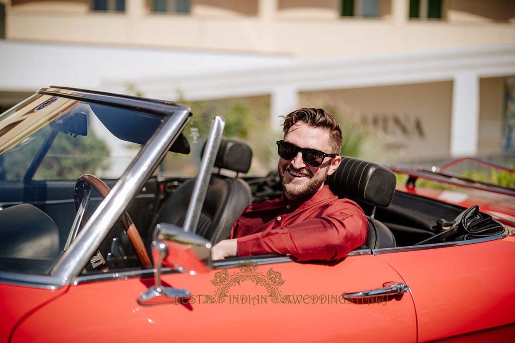red classic car indian wedding sicily 1024x683 - A Cross-Cultural Fairytale in Sicily: A South-Indian Wedding Celebration Overlooking the Sea