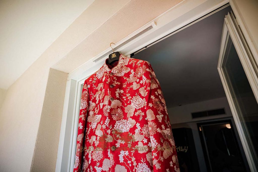 red shervani indian groom outfit 1024x683 - A Cross-Cultural Fairytale in Sicily: A South-Indian Wedding Celebration Overlooking the Sea