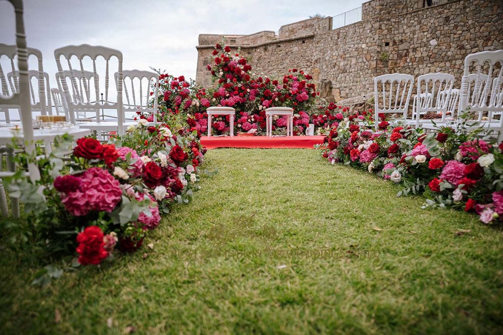 red wedding mandap floral decor 1 1024x683 - A Cross-Cultural Fairytale in Sicily: A South-Indian Wedding Celebration Overlooking the Sea