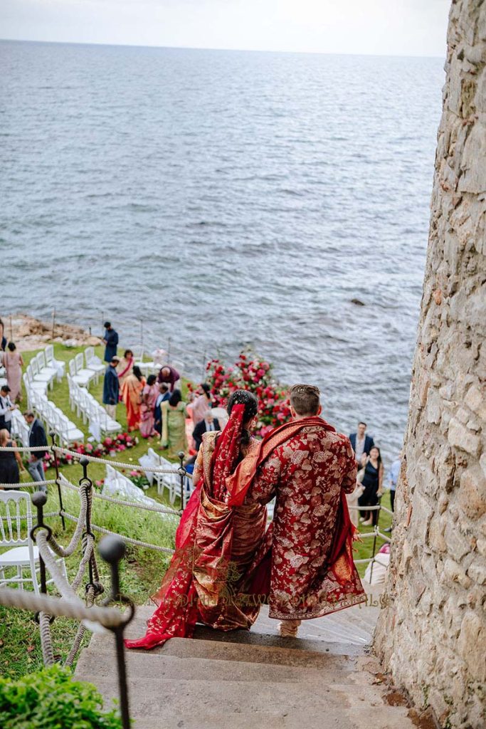 red wedding outfits indian couple 683x1024 - A Cross-Cultural Fairytale in Sicily: A South-Indian Wedding Celebration Overlooking the Sea