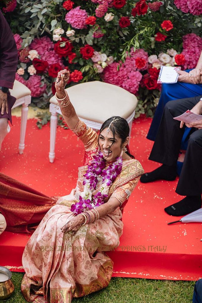 ring game indian wedding 683x1024 - A Cross-Cultural Fairytale in Sicily: A South-Indian Wedding Celebration Overlooking the Sea