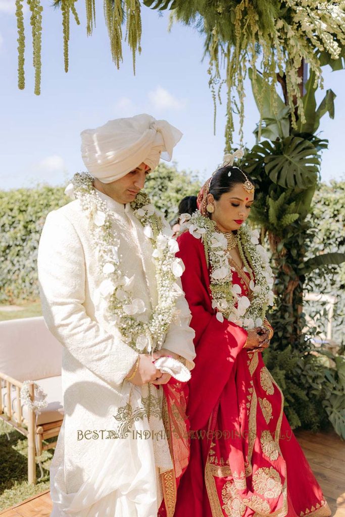 elegant indian couple outfits 683x1024 - Enchanting Indian Wedding in Puglia with A Unique Mandap Design