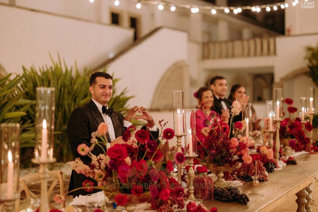 red fruit and flowers reception decor italy 1024x683 - Enchanting Indian Wedding in Puglia with A Unique Mandap Design