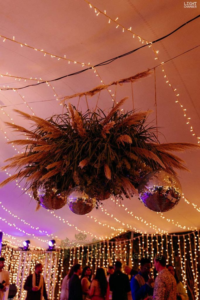 pampas and disco balls decor 683x1024 - Radiant Indian-Persian Wedding in Puglia: Iconic Venues and Cultural Fusion