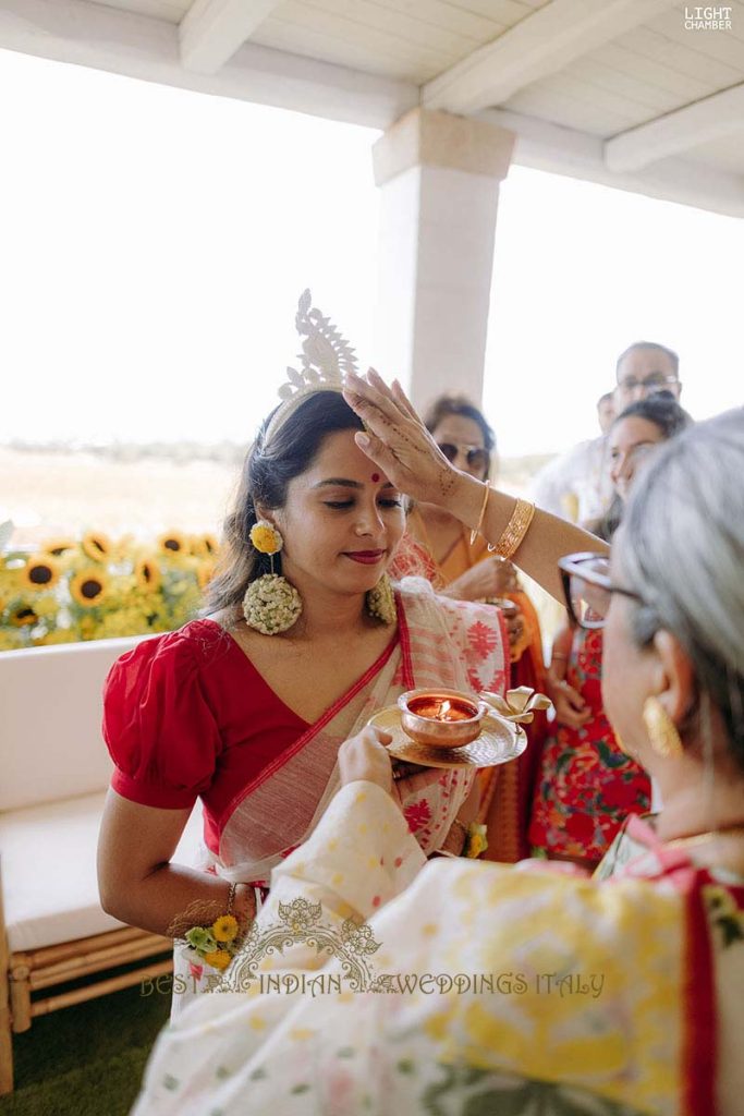 pithi bengali bride puglia 683x1024 - Radiant Indian-Persian Wedding in Puglia: Iconic Venues and Cultural Fusion
