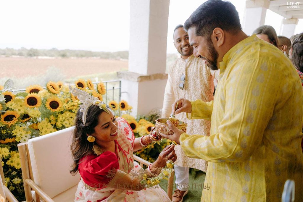 yellow flowers haldi decor italy 1024x683 - Radiant Indian-Persian Wedding in Puglia: Iconic Venues and Cultural Fusion