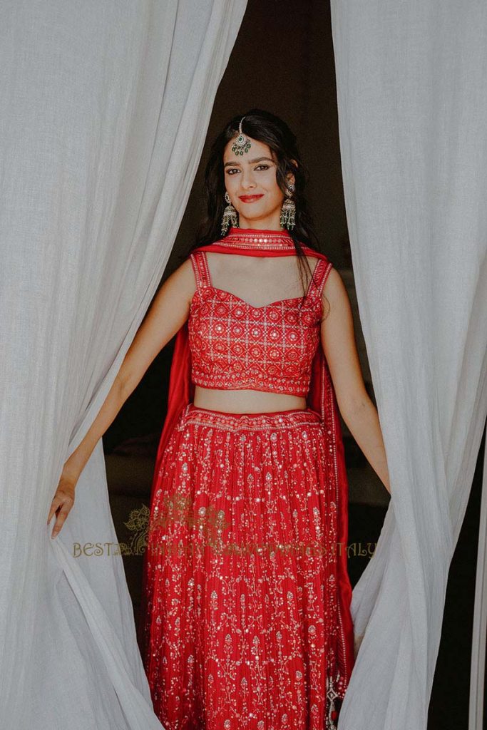 red bridal lehenga italy 683x1024 - Intimate Micro Wedding on the Amalfi Coast: Pratiksha &amp; Amit's Fairy Tale