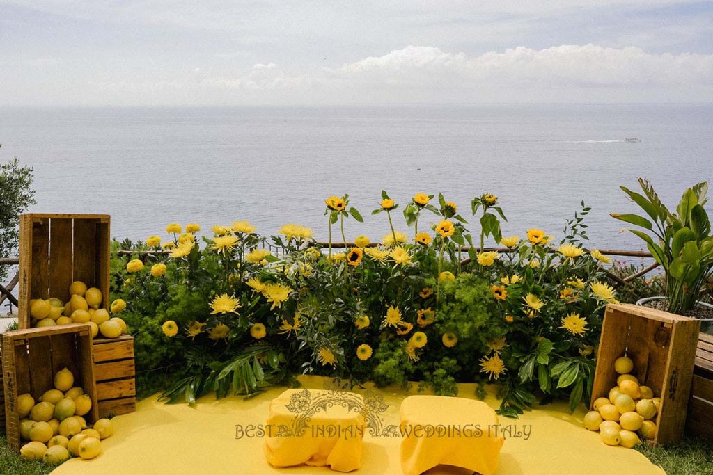 sunflowers haldi backdrop 1024x683 - Intimate Micro Wedding on the Amalfi Coast: Pratiksha &amp; Amit's Fairy Tale